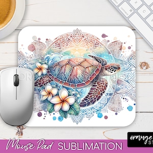 May include: A white mouse pad with a colorful watercolor design featuring a sea turtle, flowers, and a mandala pattern. The turtle is brown and green with a blue and white background.