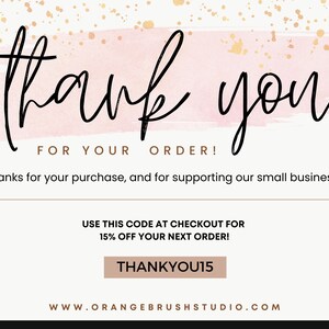 May include: A pink and gold thank you card with the text "thank you" in black script font. The card includes the text "FOR YOUR ORDER!" and "Thanks for your purchase, and for supporting our small business!" The card also includes a discount code: "USE THIS CODE AT CHECKOUT FOR 15% OFF YOUR NEXT ORDER! THANKYOU15" and the website address "WWW.ORANGEBRUSHSTUDIO.COM".