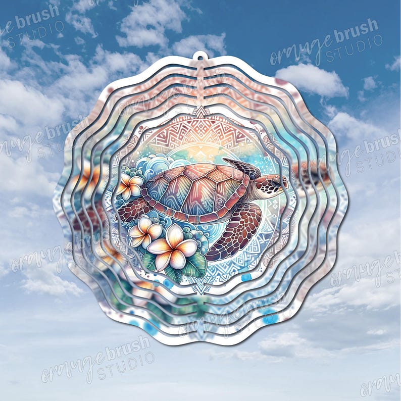 May include: A layered metal wind spinner featuring a sea turtle design. The turtle has a patterned shell and is surrounded by flowers and waves. The background includes a blue sky with clouds and the text "orange brush STUDIO".