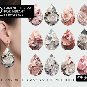 May include: Twelve printable earring designs featuring floral patterns in shades of pink, white, and green. The designs are in the shape of teardrops and are arranged in a grid. The text "EARRING DESIGNS FOR INSTANT DOWNLOAD" is at the top of the image. The text "FULL PRINTABLE BLANK 8.5" X 11" INCLUDED" is at the bottom of the image. The text "orange brush STUDIO" is in the bottom right corner of the image.