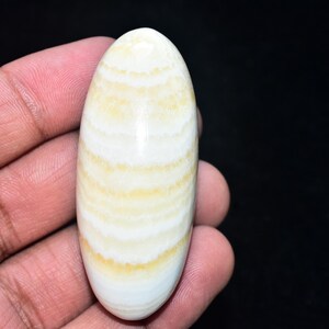 Premium !!! Yellow Calcite Lingam, Healing Crystal Palmstone Crystals  Self Love (Boosting - Self Confidence) 55.51 gm. 60x25 mm. B-250