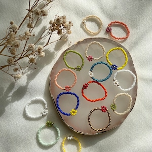 Handmade pearl rings with small flowers/ handmade pearl rings/ small flower rings/ delicate flower rings/ pearl rings/ flower rings