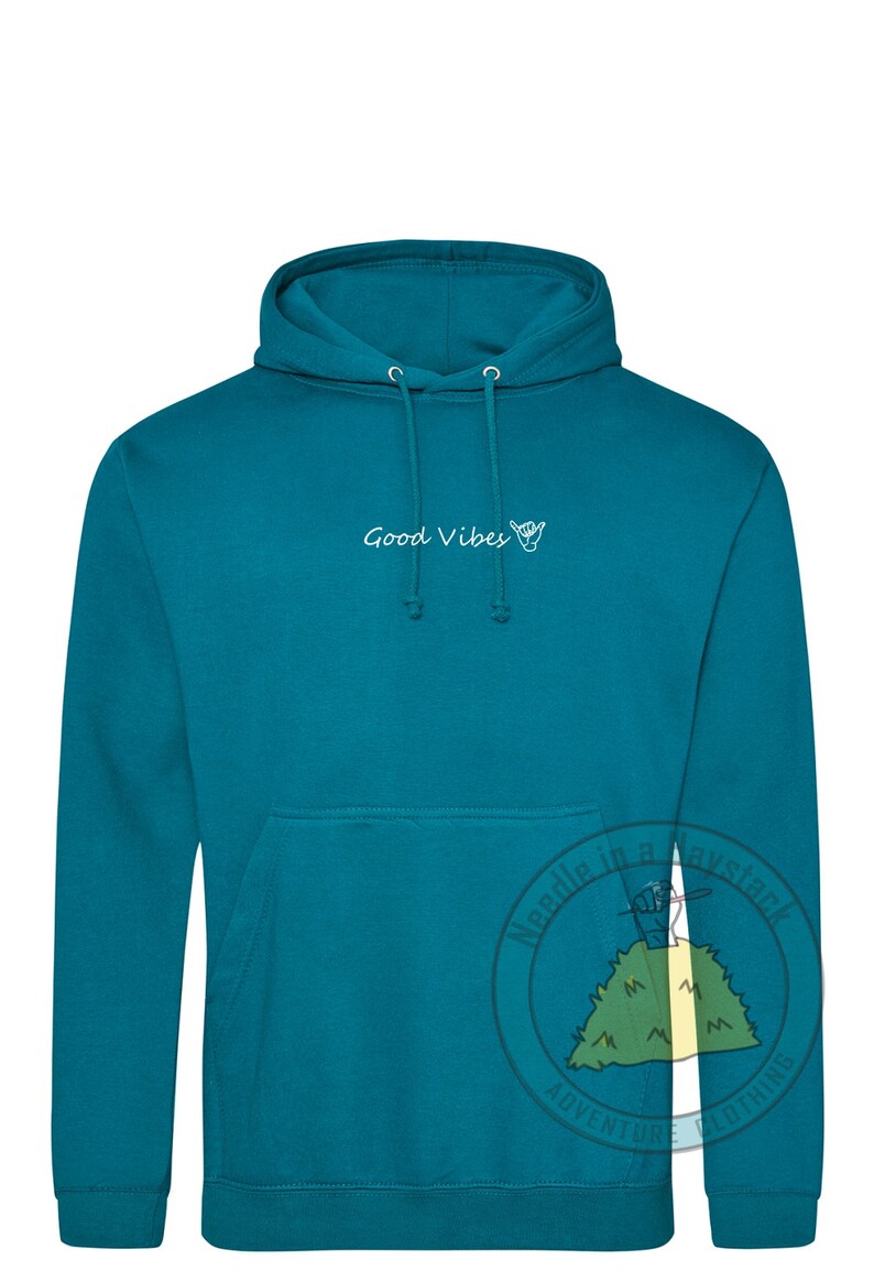 May include: Teal blue hoodie with a white graphic that says "Good Vibes" and a hand gesture.