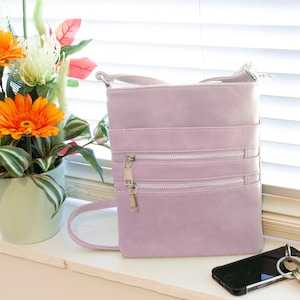 Mittelgroße Crossbody/Schultertasche für Frauen Kunstleder Hellrosa