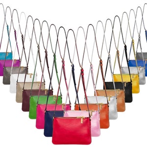 Un sac bandoulière/épaule classique pour femme, poches zippées, simili cuir, différentes couleurs