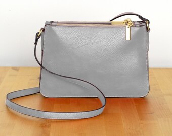 gray leather bag