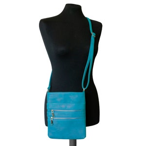 Bolsa média transversal/de ombro feminina em couro sintético turquesa 2