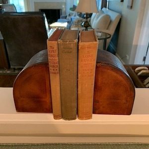 Vintage tooled leather horse figure bookends