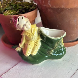 This 1950s-1960s Large Elf and Shoe Planter is a must have for anyone who loves Retro Decor
