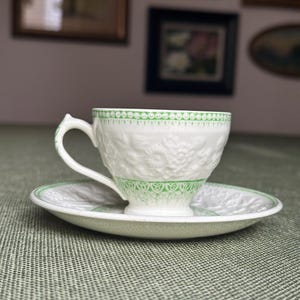 Antique George Jones and Sons demitasse cup and saucer
