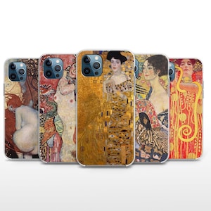 May include: Five different phone cases featuring artwork by Gustav Klimt. The cases are all clear and show the artwork through the case. The artwork is in a variety of colors, including gold, red, and blue. The cases are all for iPhones.