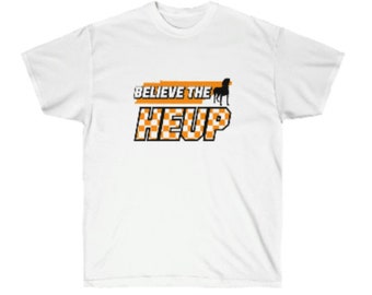 May include: White t-shirt with a black and orange graphic that says "Believe the Heup" with a checkered pattern and a silhouette of a dog.