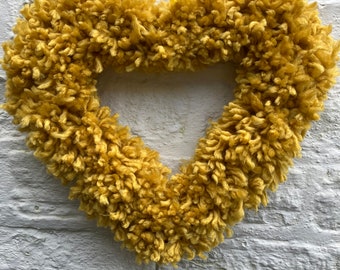 Lovely sustainable mustard wool heart wreath, wall,door hanging size 16” x12”
