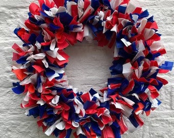 Stunning red, white and blue showerproof rag wreath size 15”