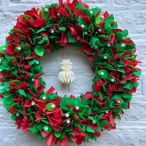 Gorgeous showerproof Christmas rag, ruffle red and green wreath, ring,wall,door wreath with Christmas leaves and berries 16”