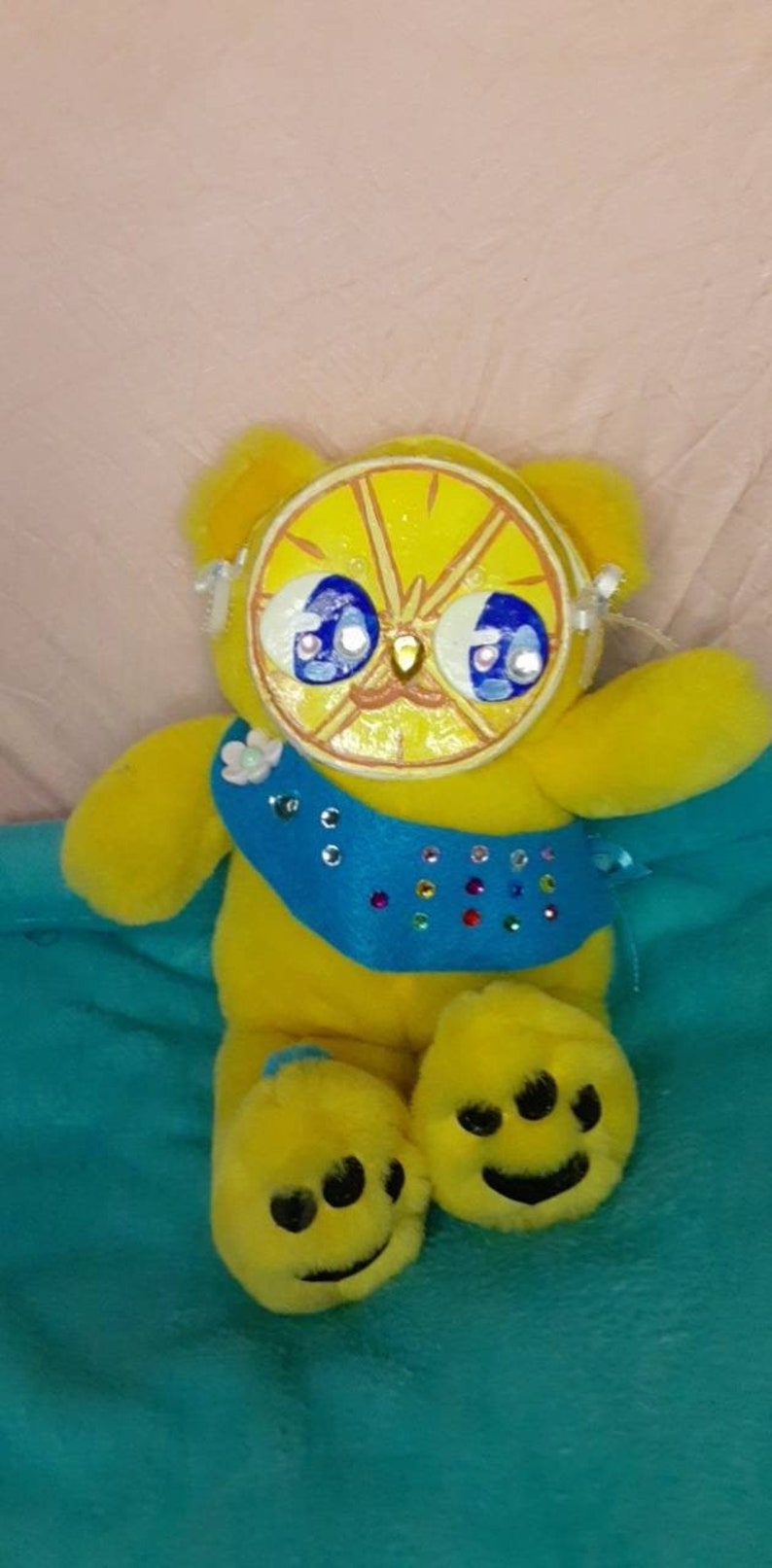 stuffed animals with clay faces