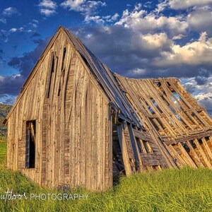 A rustic old barn near the Teton mountain range.  Available in multiple formats.