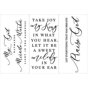 May include: Three black and white signs with inspirational quotes about faith and praise. The first sign says "My God Waymaker Miracle Worker Light in the Darkness". The second sign says "Take Joy My King In What You Hear. Let It Be A Sweet Melody In Your Ear". The third sign says "Let Everything That Has Breath Praise God".