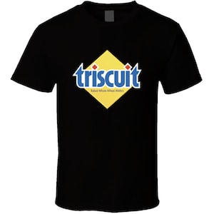 May include: Black t-shirt featuring the Triscuit logo. The logo is a yellow diamond with the word "triscuit" in blue and white, and the text "Baked Whole Wheat Wafers" below it.