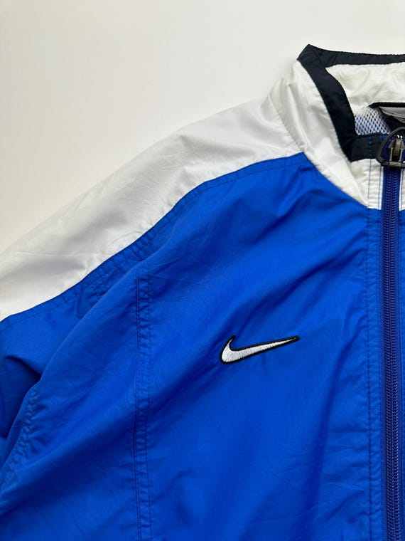 vintage nike windbreaker blue and white