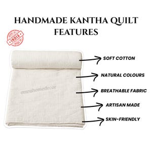 May include: Cream-coloured handmade Kantha quilt made from soft cotton. The image highlights the quilt's features: soft cotton, natural colours, breathable fabric, artisan made, and skin-friendly. The text also includes "Made in India".