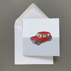 Modèle réduit de voiture miniature avec carte de voeux vierge à l'intérieur