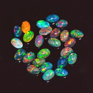 Ethiopian Opal Cabochons: Black Welo Fire Oval Gemstones, 25 Pcs Lot