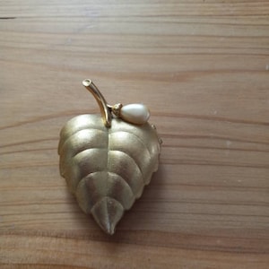 Gold Tone Leaf Locket Brooch featuring a Glass Pearl