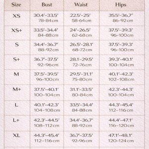 May include: A size chart with measurements for bust, waist, and hips, in inches and centimeters. Sizes range from XS to XL+, with corresponding measurements for each size. The chart is designed to help customers find the right fit.