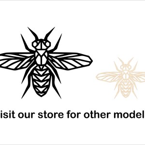 May include: A black and white geometric bee illustration with a simple design. The bee is shown with wings spread out. The image also includes a beige outline of the bee.