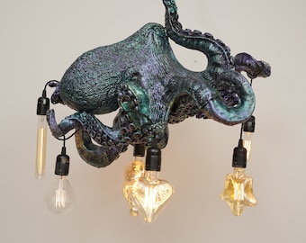 May include: A teal and purple octopus chandelier with six light bulbs. The bulbs are shaped like a heart and a star.