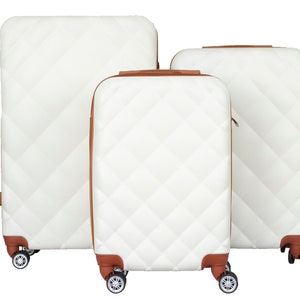 Maleta rígida con cerradura de combinación y 4 ruedas color marfil