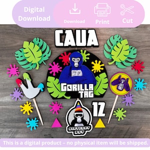 Puede incluir: Un conjunto de coloridas decoraciones de cumpleaños con temática de gorila. Incluye recortes de hojas, salpicaduras de pintura y las palabras "CAUA", "GORILLA TAG" y "BIRTHDAY BOY". También está presente el número "12".
