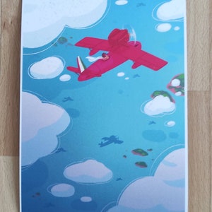 May include: A red airplane flies over a blue sky with white clouds and green islands.