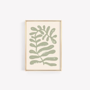 May include: A framed print with a minimalist design featuring a stylised green plant on a cream background.