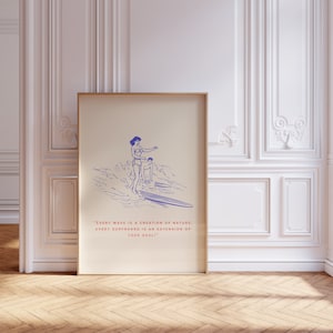 May include: A vintage-style illustration of a woman and a man surfing on a wave. The illustration is in blue and white on a beige background. The text below the illustration reads: "EVERY WAVE IS A CREATION OF NATURE. EVERY SURFBOARD IS AN EXTENSION OF YOUR SOUL."