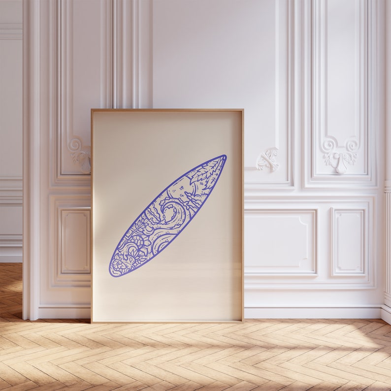 May include: A framed print of a blue line drawing of a surfboard with a wave and nature scene design.