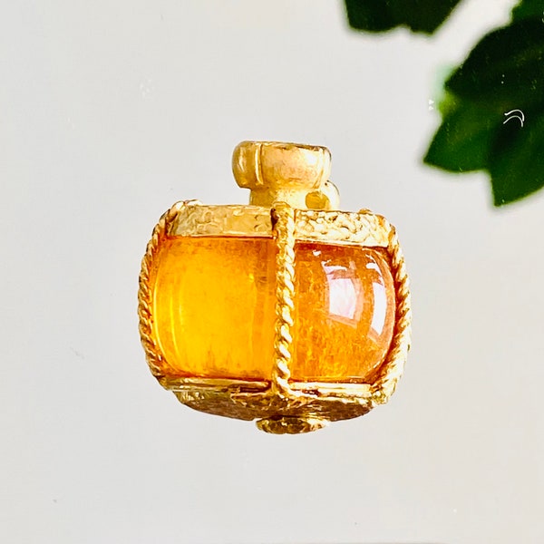 Yves Saint Laurent Pendentif vintage YSL en forme de flacon de parfum Champagne Metal doré et lucite jaune