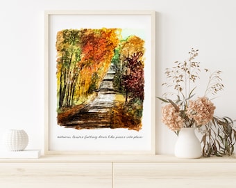 May include: A watercolor painting of a road lined with trees in autumn. The leaves are changing colors, with shades of red, orange, yellow, and green. The text "autumn leaves falling down like pieces into place" is written at the bottom of the painting.