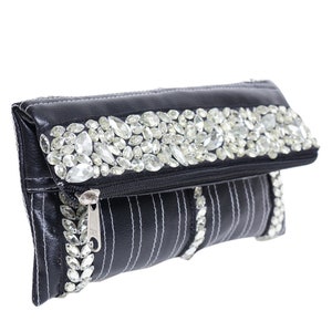 Pochette rabattable noire et blanche incrustée de GEM Noël