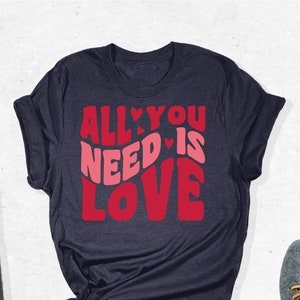 Love Is All You Need T-Shirt, Valentine&#39;s Day Shirt, Apparel With Valentine Quote, Valentine&#39;s Outfit, Cute Valentines Day Gifts, Lover Tees