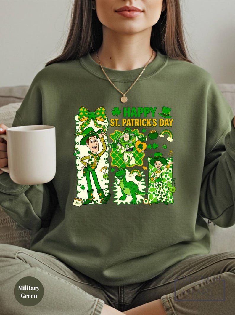 A woman wearing a green sweater with a cartoon character and text related to St. Patrick's Day.