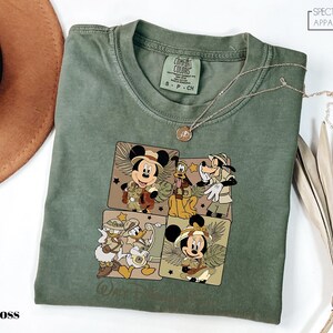 a t - shirt with a mickey mouse picture on it