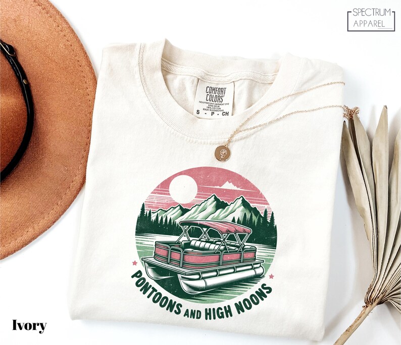 a hat, sunglasses, and a t - shirt with a picture of a truck