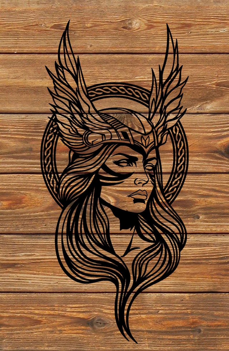 May include: Black and white line art illustration of a woman with long flowing hair wearing a winged helmet with a Celtic knot design.