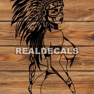 May include: Black and white silhouette of a woman wearing a headdress with feathers. The woman is facing away from the viewer and has her hair in a braid. The image is set against a woodgrain background.