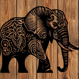 May include: Black and white silhouette of an elephant with intricate patterns on its body. The elephant is facing right and has its trunk raised.