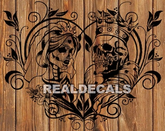 May include: Black and white illustration of a king and queen skull couple with floral accents. The king is wearing a crown and the queen is wearing a tiara. The couple is surrounded by a heart-shaped frame.