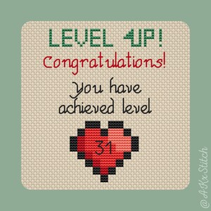 May include: A pixelated heart with the number 31 inside. The text "LEVEL UP! Congratulations! You have achieved level" is above the heart.