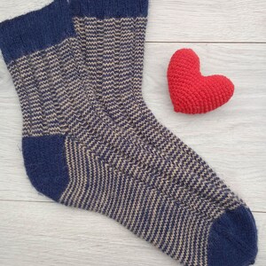Handmade blue knitted socks